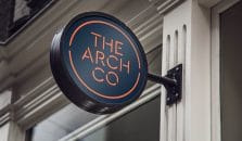 The Arch Co. signage